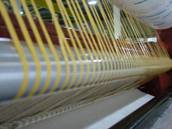 Machine running striped coating